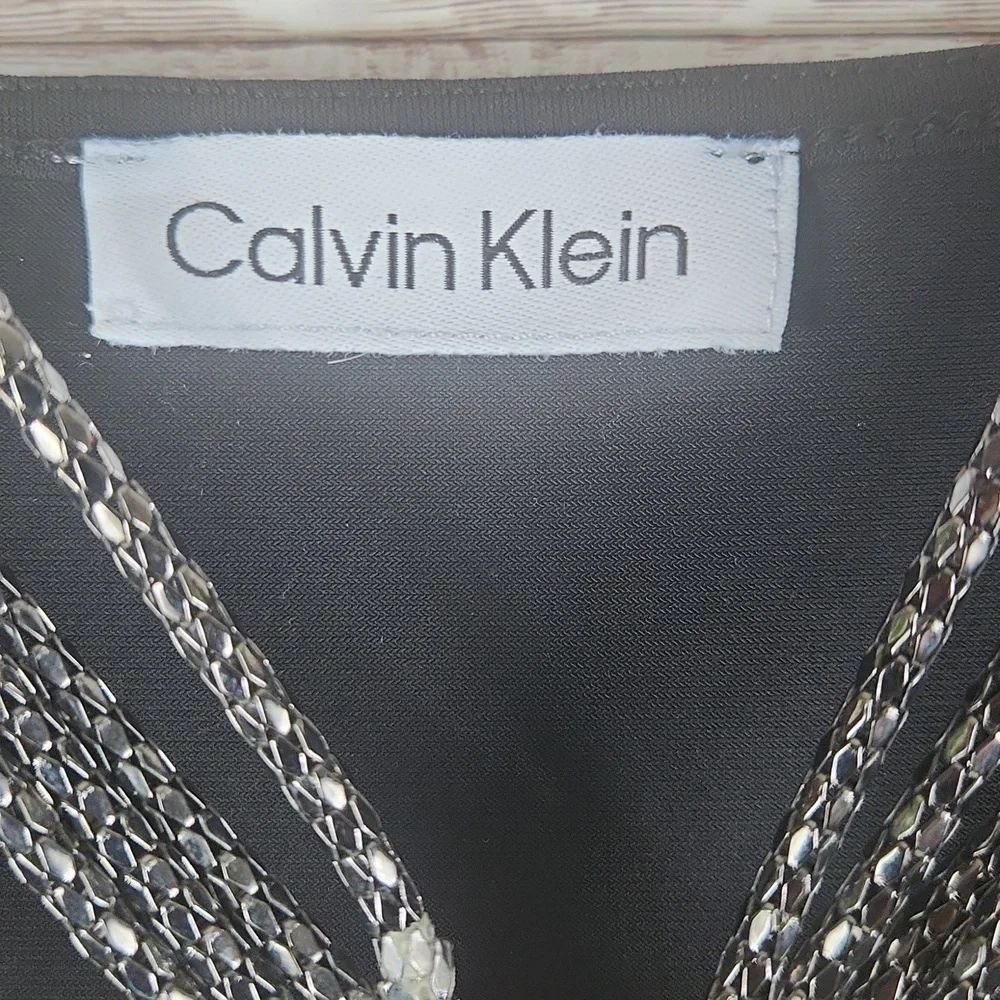 Calvin Klein, Women's Black Tunic Top With Sheer Ballon Long Sleeves and Cuffs. - Picture 11 of 11